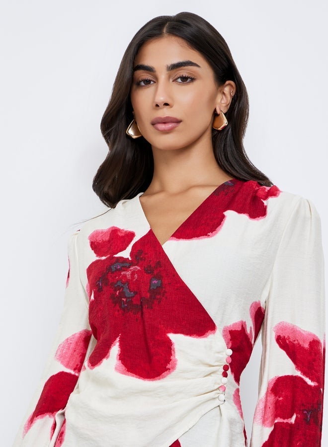 ستايلي بلوزة بطبعة زهور ونمط لف - Image 3